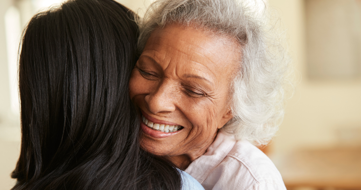 Two women embracing in a hug