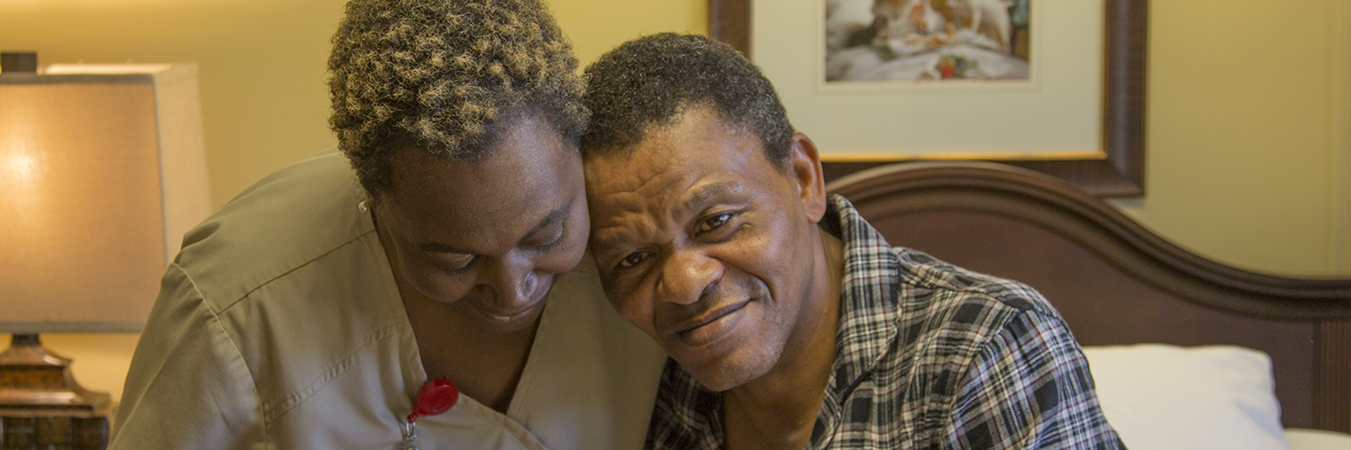 nurse giving resident a hug