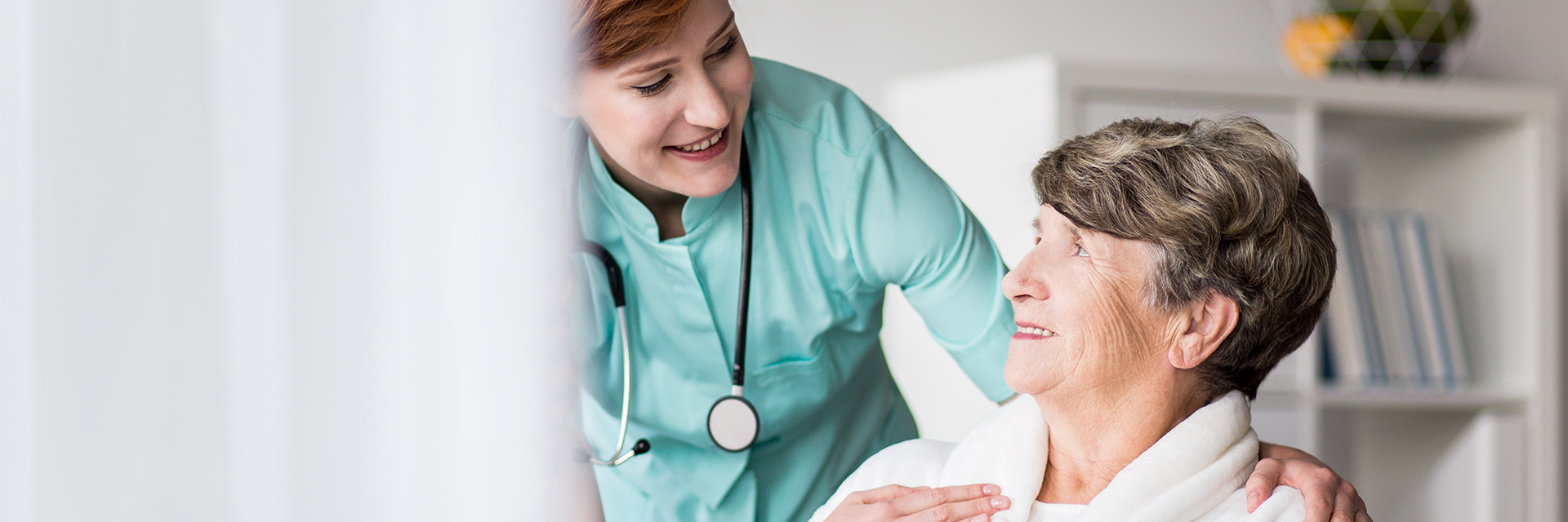 nurse reassuring patient